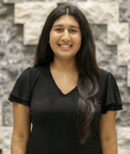 A woman smiling. 